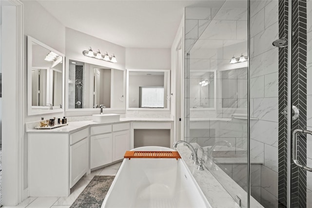 bathroom featuring vanity and shower with separate bathtub