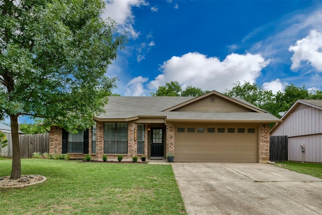 ranch-style home with a garage and a front yard