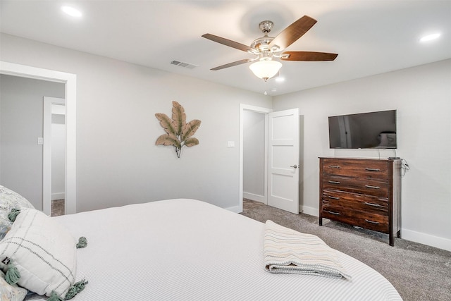 bedroom with ceiling fan and carpet floors