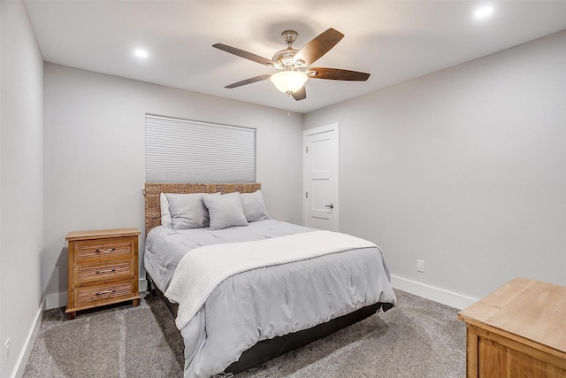 carpeted bedroom featuring ceiling fan