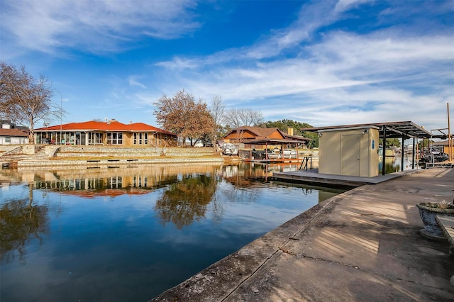 dock area with a water view