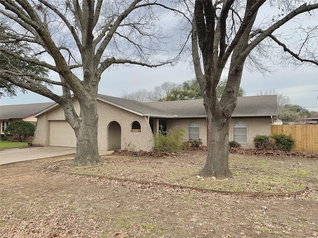 ranch-style house featuring a garage