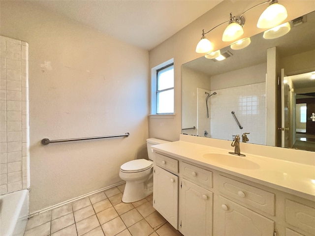 full bathroom featuring toilet, vanity, tiled shower / bath combo, and tile patterned flooring