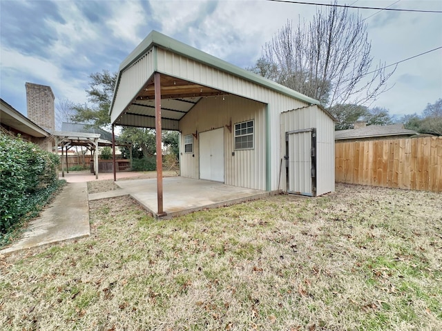 view of outdoor structure with a yard