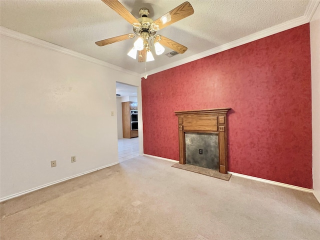 unfurnished living room featuring ceiling fan, light colored carpet, a textured ceiling, and crown molding