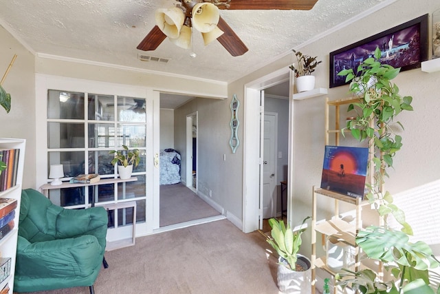 entrance to property featuring ceiling fan