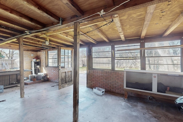 unfurnished sunroom featuring plenty of natural light