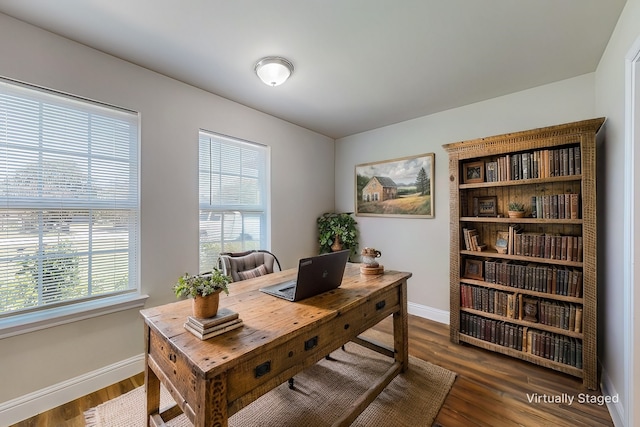 home office featuring dark hardwood / wood-style flooring