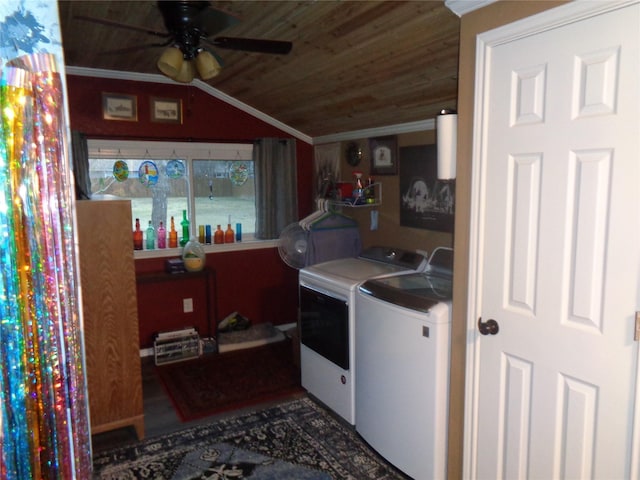 washroom with ceiling fan, wooden ceiling, crown molding, and washing machine and clothes dryer