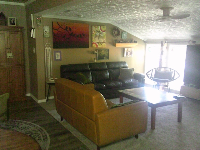 living room featuring ceiling fan and ornamental molding