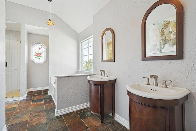 bathroom with vanity, vaulted ceiling, and shower with separate bathtub