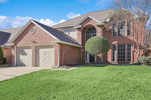 front facade with a garage and a front lawn