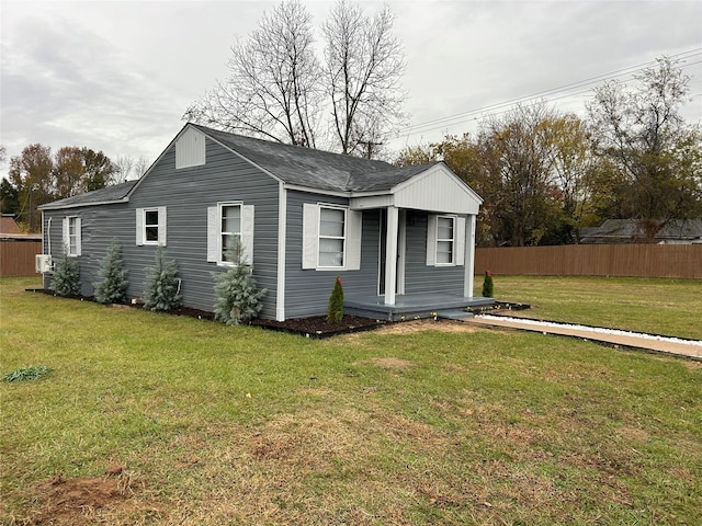 view of property exterior with a lawn