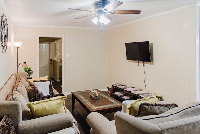 living room featuring ceiling fan and ornamental molding