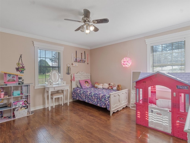 bedroom with ceiling fan, ornamental molding, and multiple windows