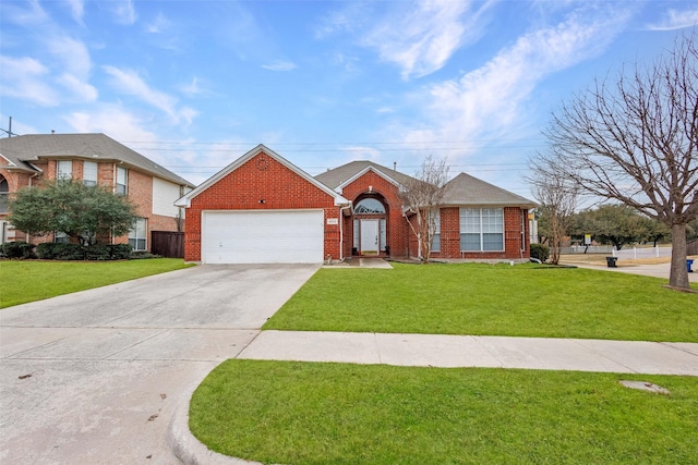 view of front facade with a garage and a front lawn