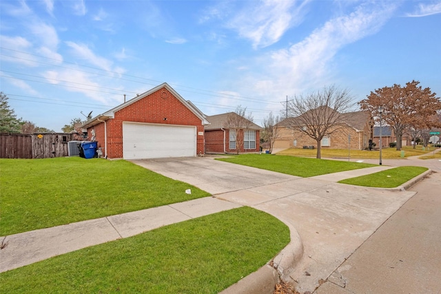 view of front facade with a garage and a front lawn