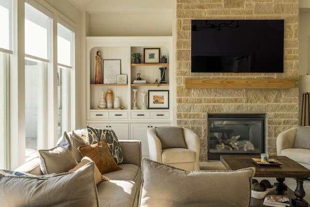 interior space with built in features and a fireplace