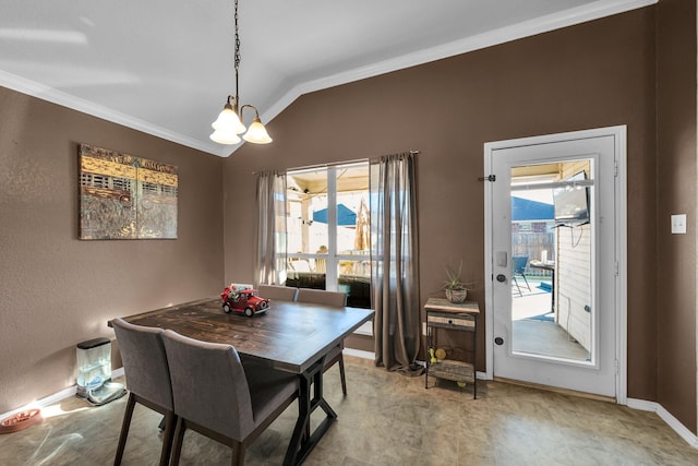 dining room featuring a wealth of natural light, crown molding, lofted ceiling, and an inviting chandelier