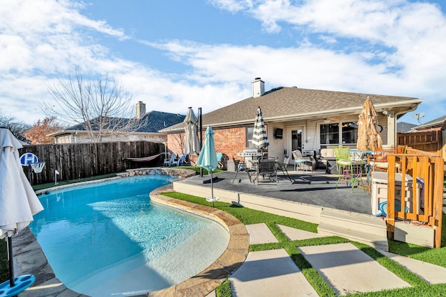 view of pool with a patio