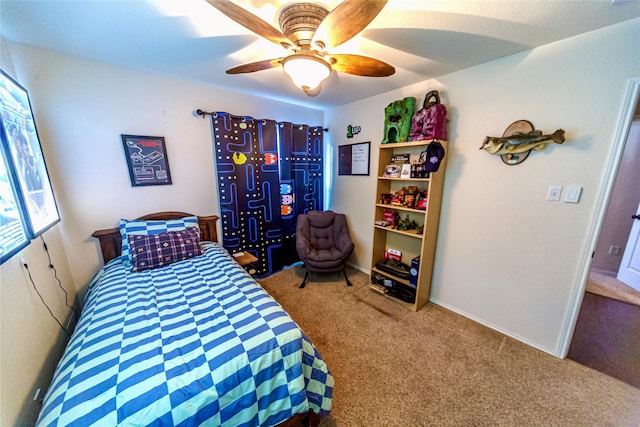 bedroom featuring ceiling fan and carpet floors