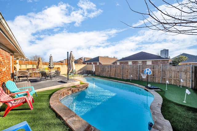 view of swimming pool featuring a patio