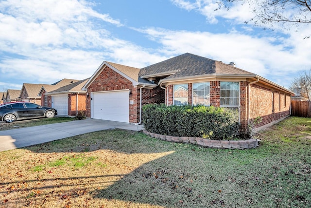 view of front facade with a garage and a front yard