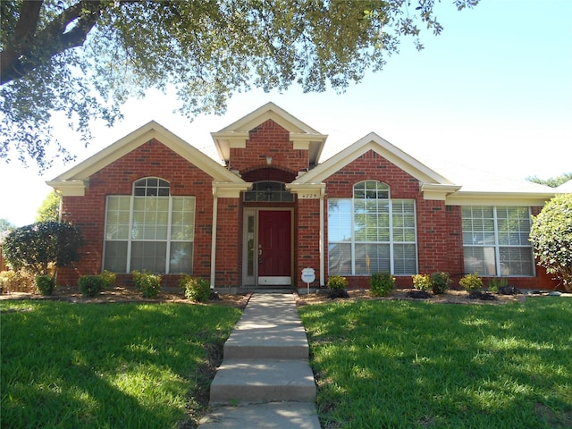 view of front of house with a front lawn