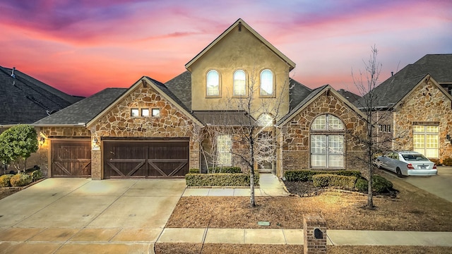 view of front of property with a garage