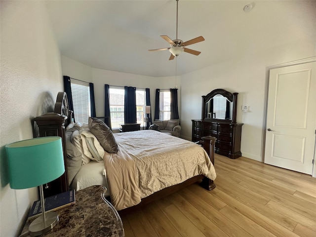 bedroom featuring ceiling fan and light hardwood / wood-style floors