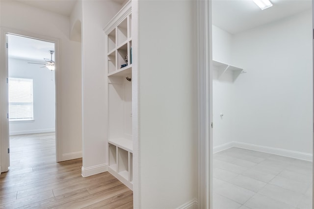 mudroom featuring ceiling fan