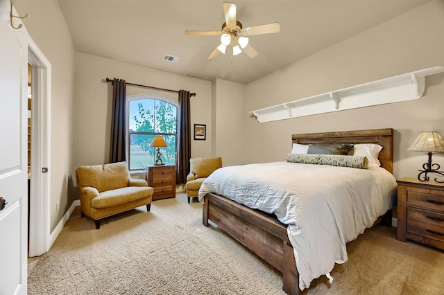 bedroom featuring light carpet and ceiling fan