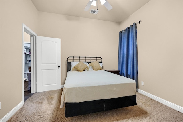 bedroom with ceiling fan and carpet floors