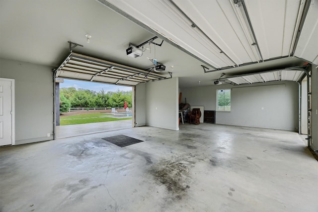 garage featuring a garage door opener