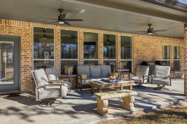 view of patio featuring ceiling fan and outdoor lounge area