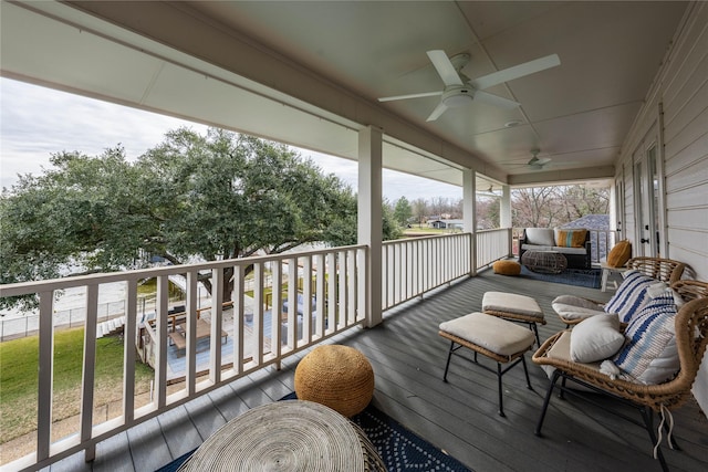 wooden terrace with ceiling fan