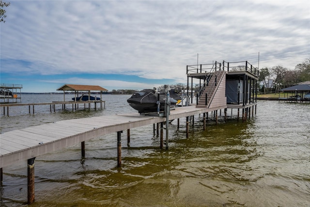 dock area featuring a water view