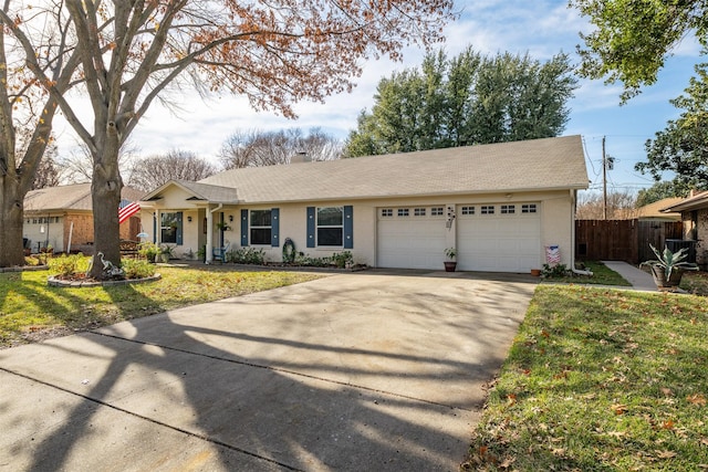 ranch-style house with a front lawn and a garage