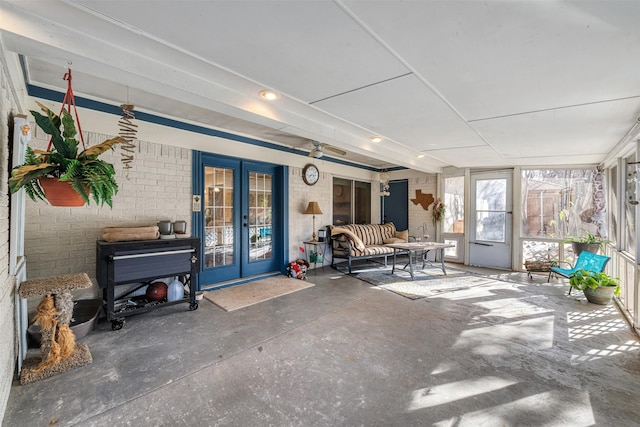 sunroom featuring french doors