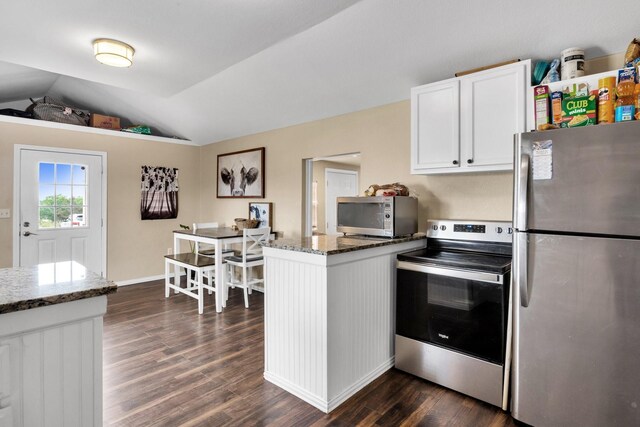 bedroom with ceiling fan, separate washer and dryer, dark hardwood / wood-style flooring, and lofted ceiling