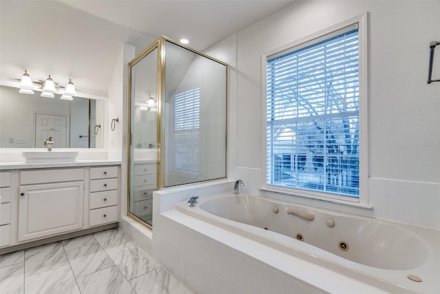 bathroom featuring vanity and plus walk in shower