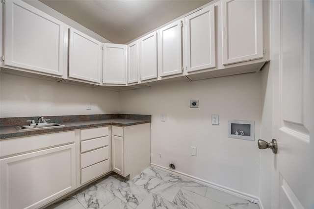 laundry room with sink, washer hookup, electric dryer hookup, and cabinets