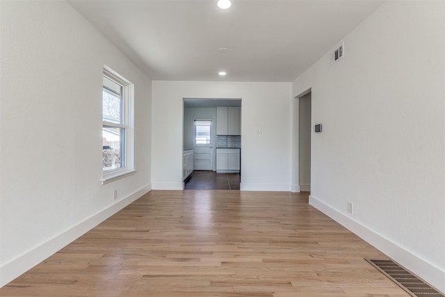 empty room featuring light hardwood / wood-style floors