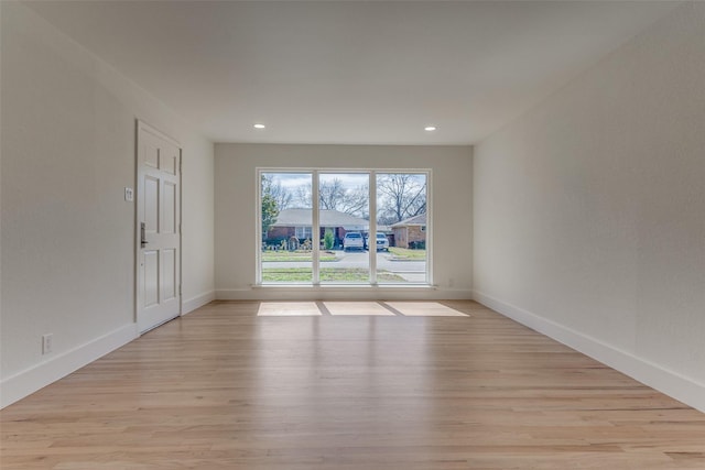 empty room featuring light hardwood / wood-style floors