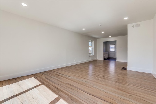 empty room with light wood-type flooring