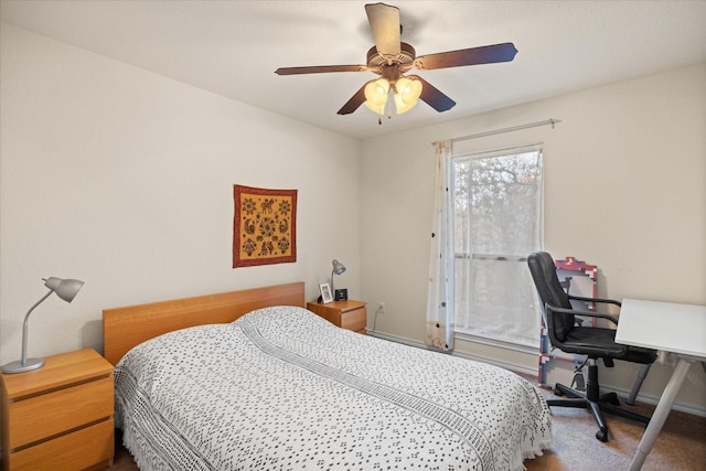 bedroom with ceiling fan and carpet flooring