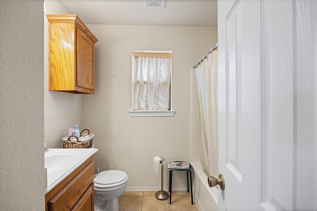 full bathroom with toilet, tile patterned flooring, shower / bathtub combination with curtain, and vanity