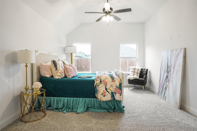 bedroom with ceiling fan, multiple windows, lofted ceiling, and carpet flooring