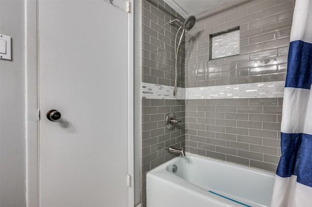 bathroom with shower / bath combo