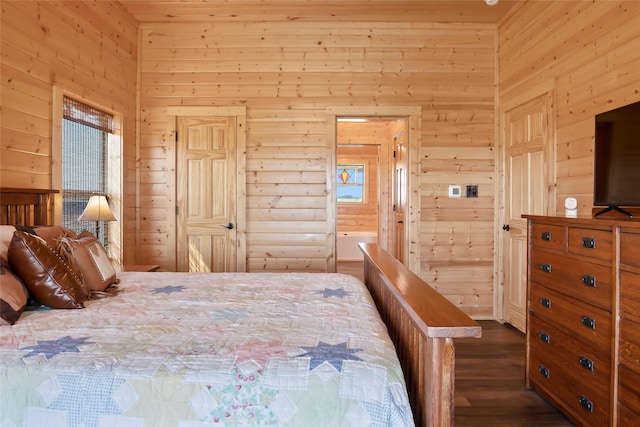 bedroom featuring log walls